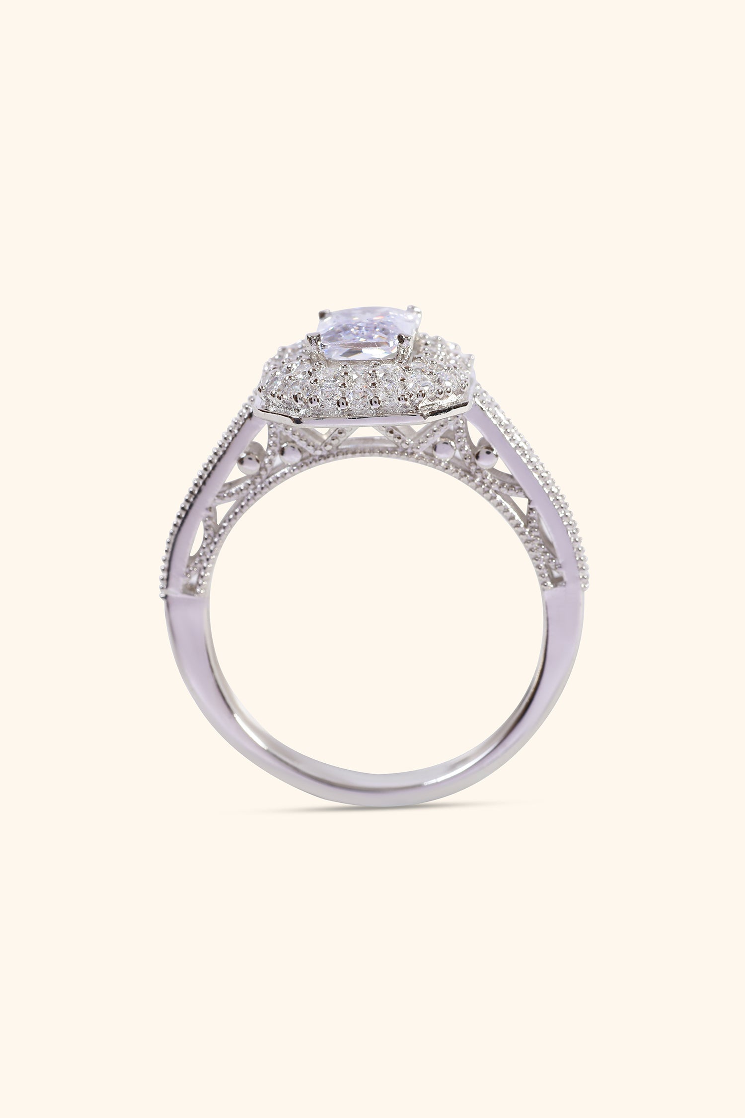 Celestina Double Studded Halo and Pave Ring with Emerald Solitaire