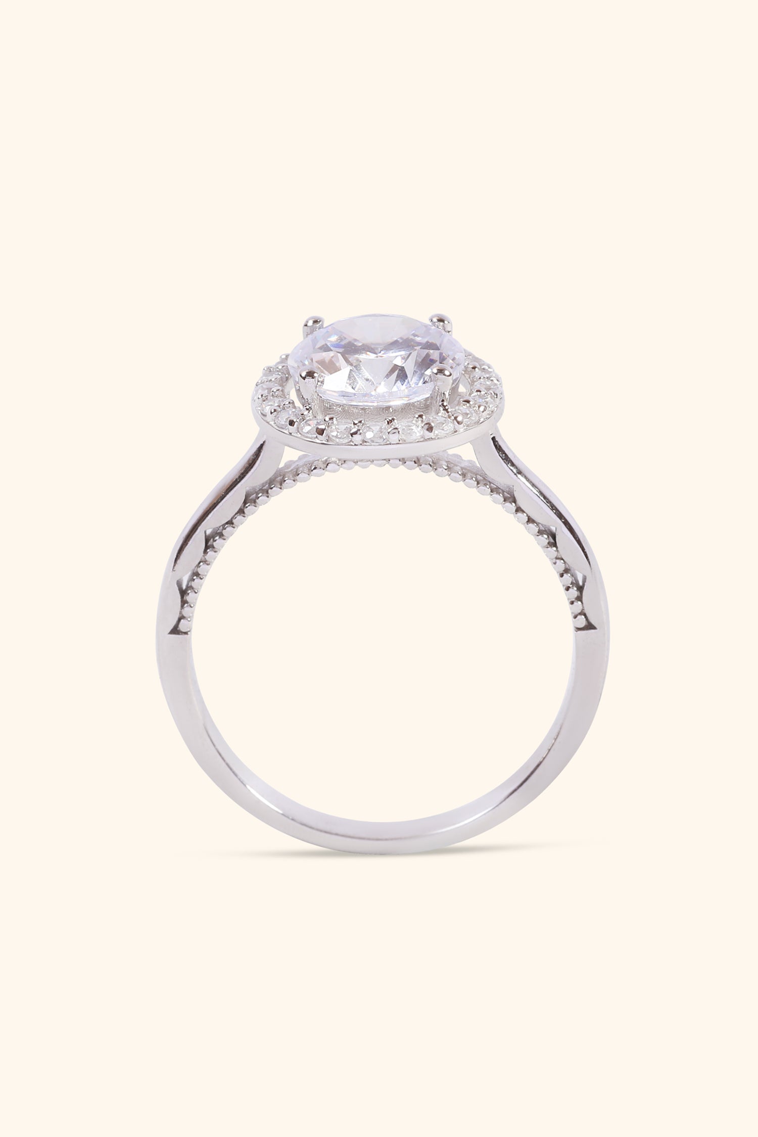 Gabriela with Round Brilliant Solitaire and Halo Ring