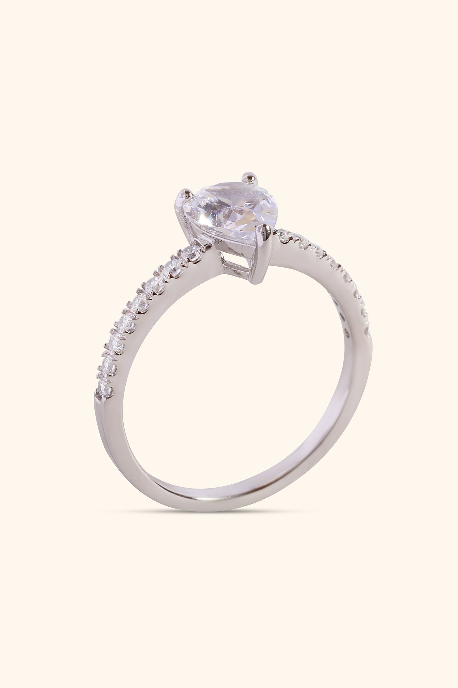 Dulce Pear Solitaire Ring on a Pavé Ring