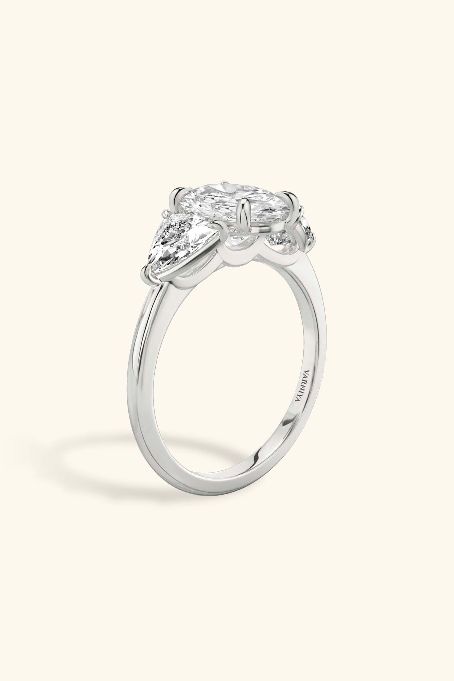 Trilogy Grace Oval with 1/2 Ct Trillion Side Stones