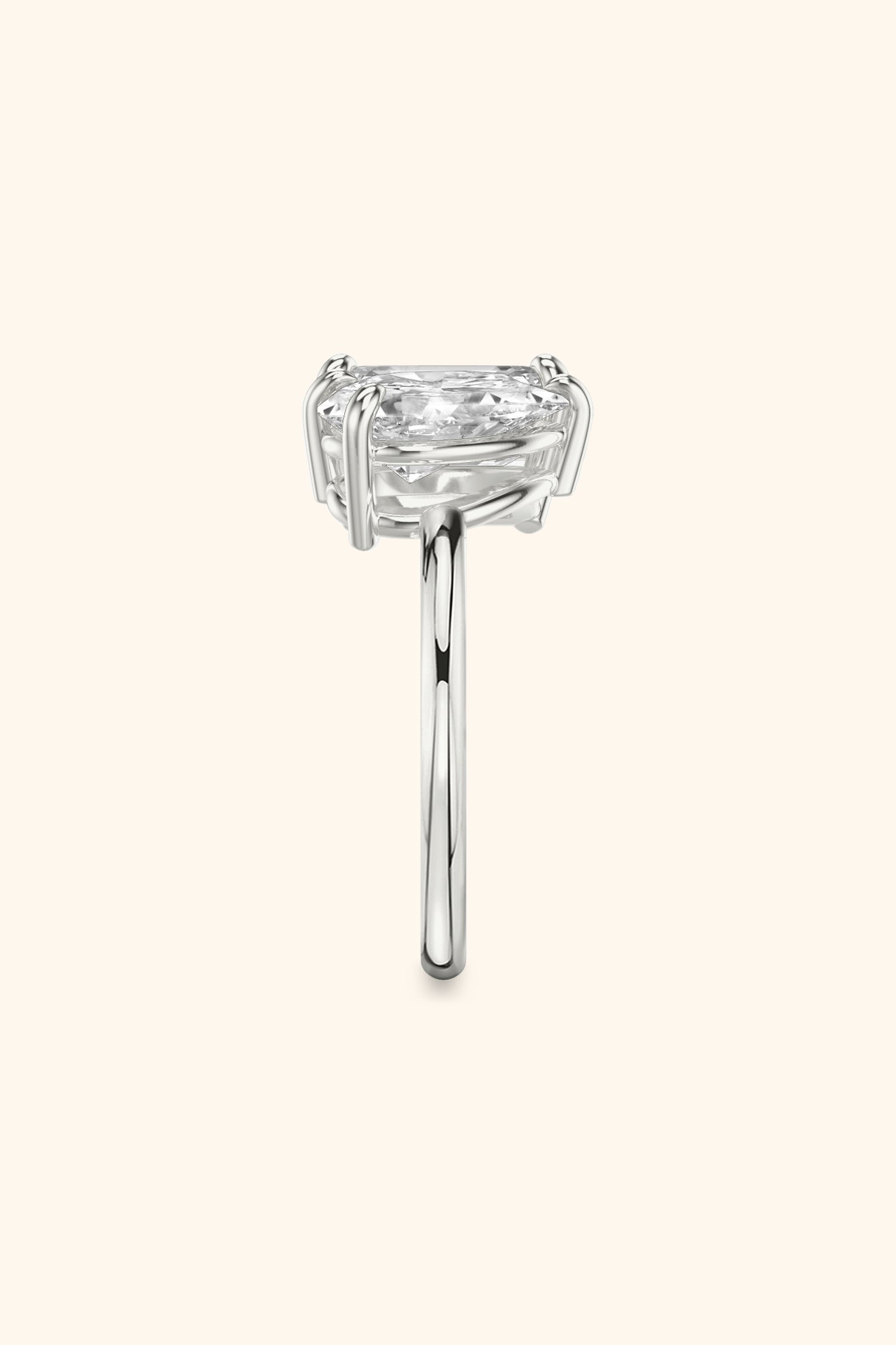 Luminosa Emerald and Pear Solitaire Ring
