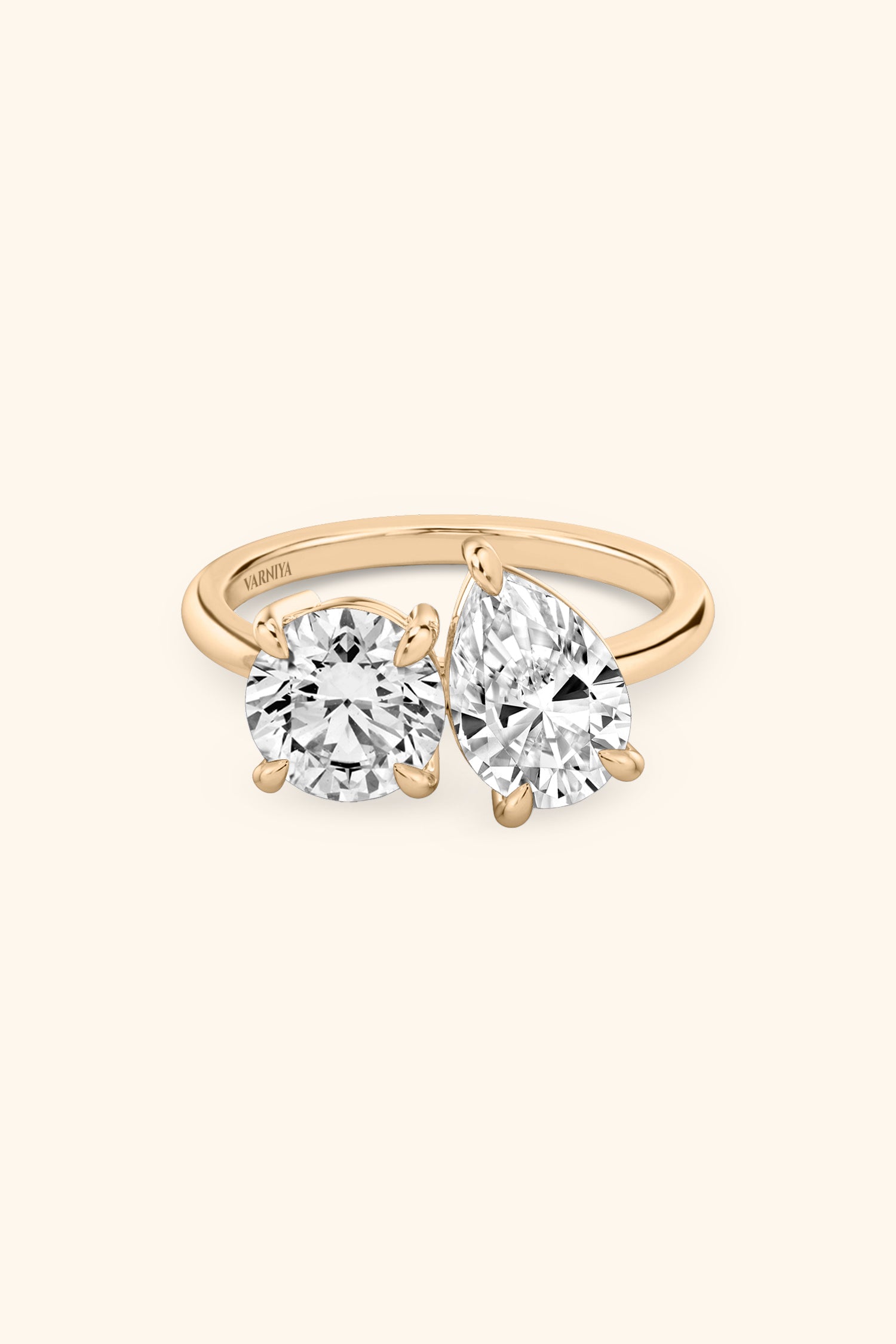 Luminosa Round and Pear Solitaire Ring