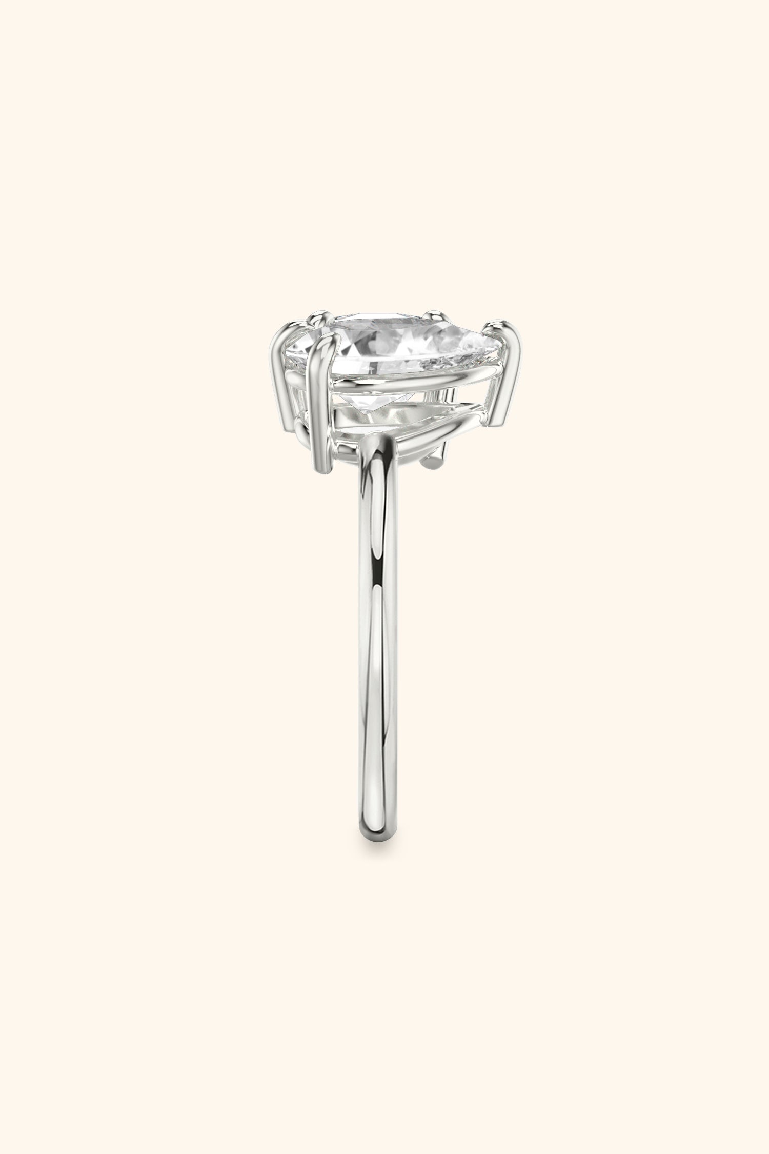 Luminosa Round and Pear Solitaire Ring