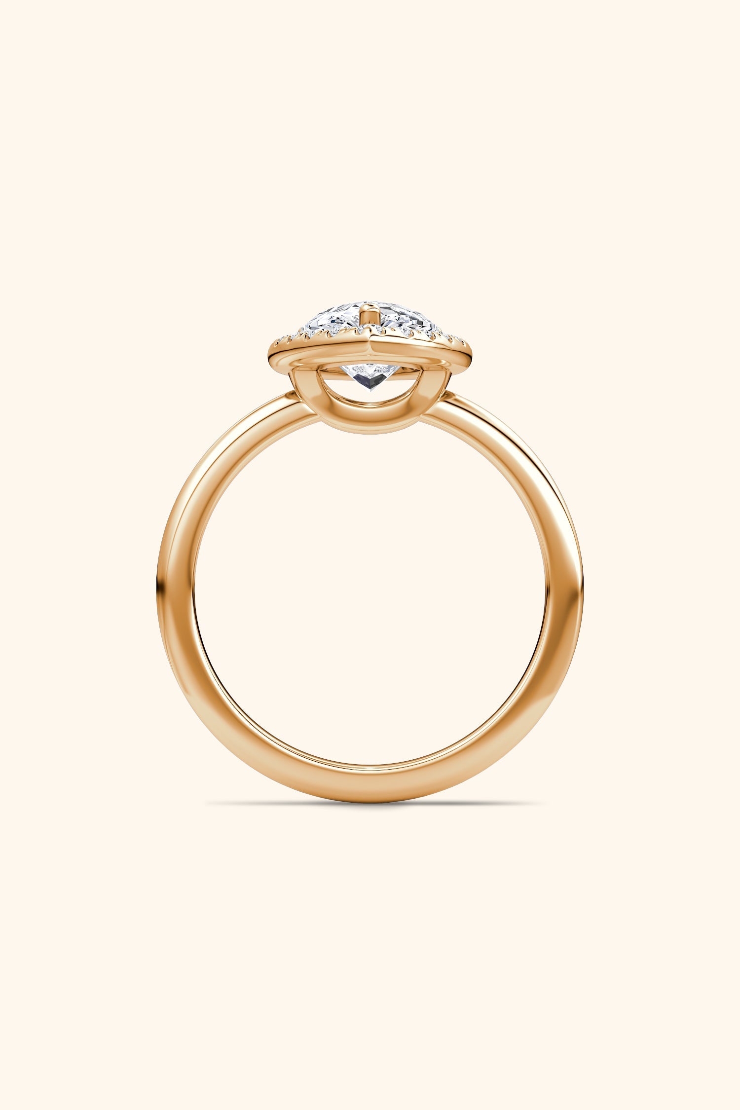 Angelica Pear Solitaire Ring with a Classic Halo