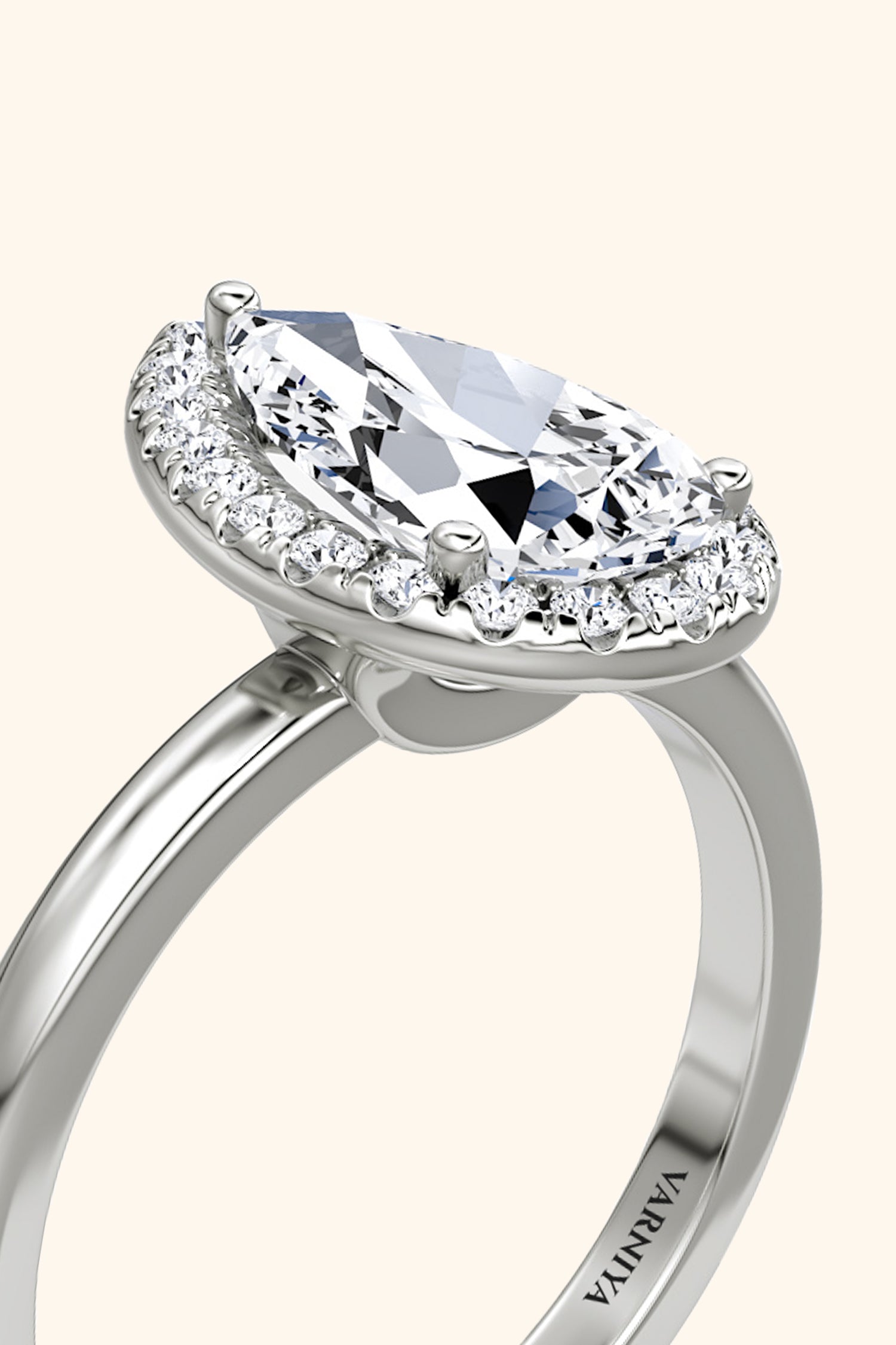 Angelica Pear Solitaire Ring with a Classic Halo