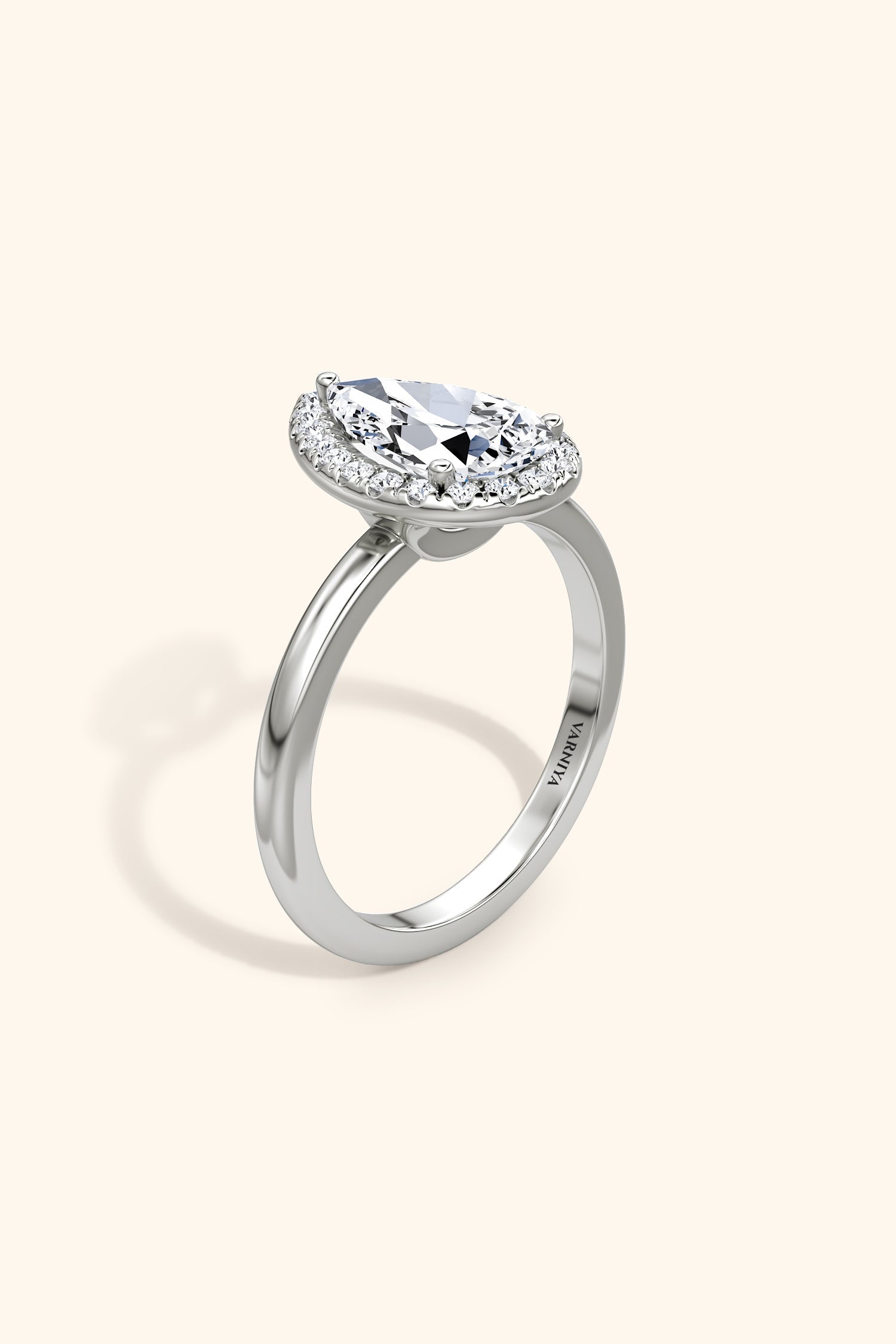 Angelica Pear Solitaire Ring with a Classic Halo