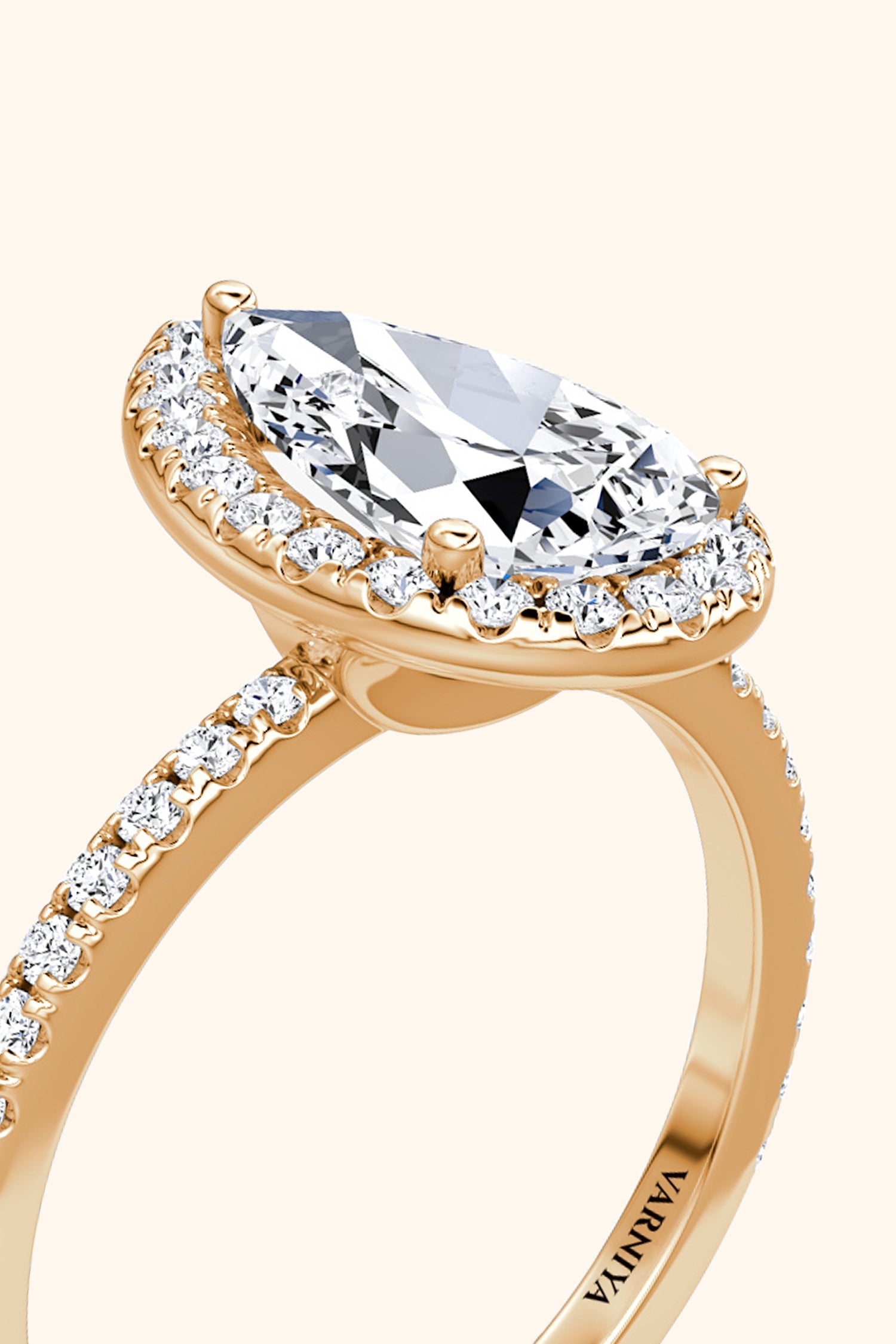 Angelica Pear Solitaire Pavé Ring with a Classic Halo