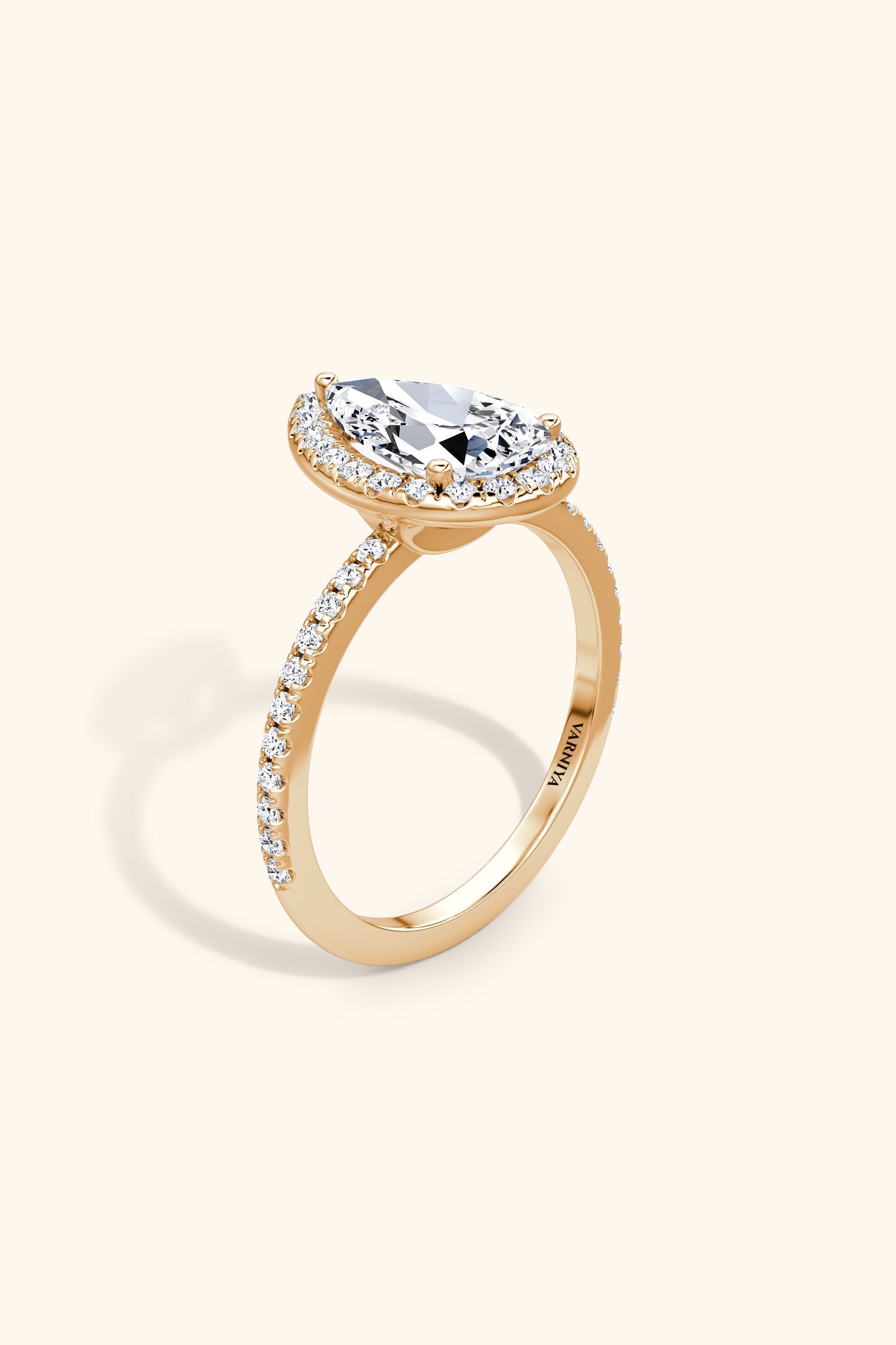 Angelica Pear Solitaire Pavé Ring with a Classic Halo