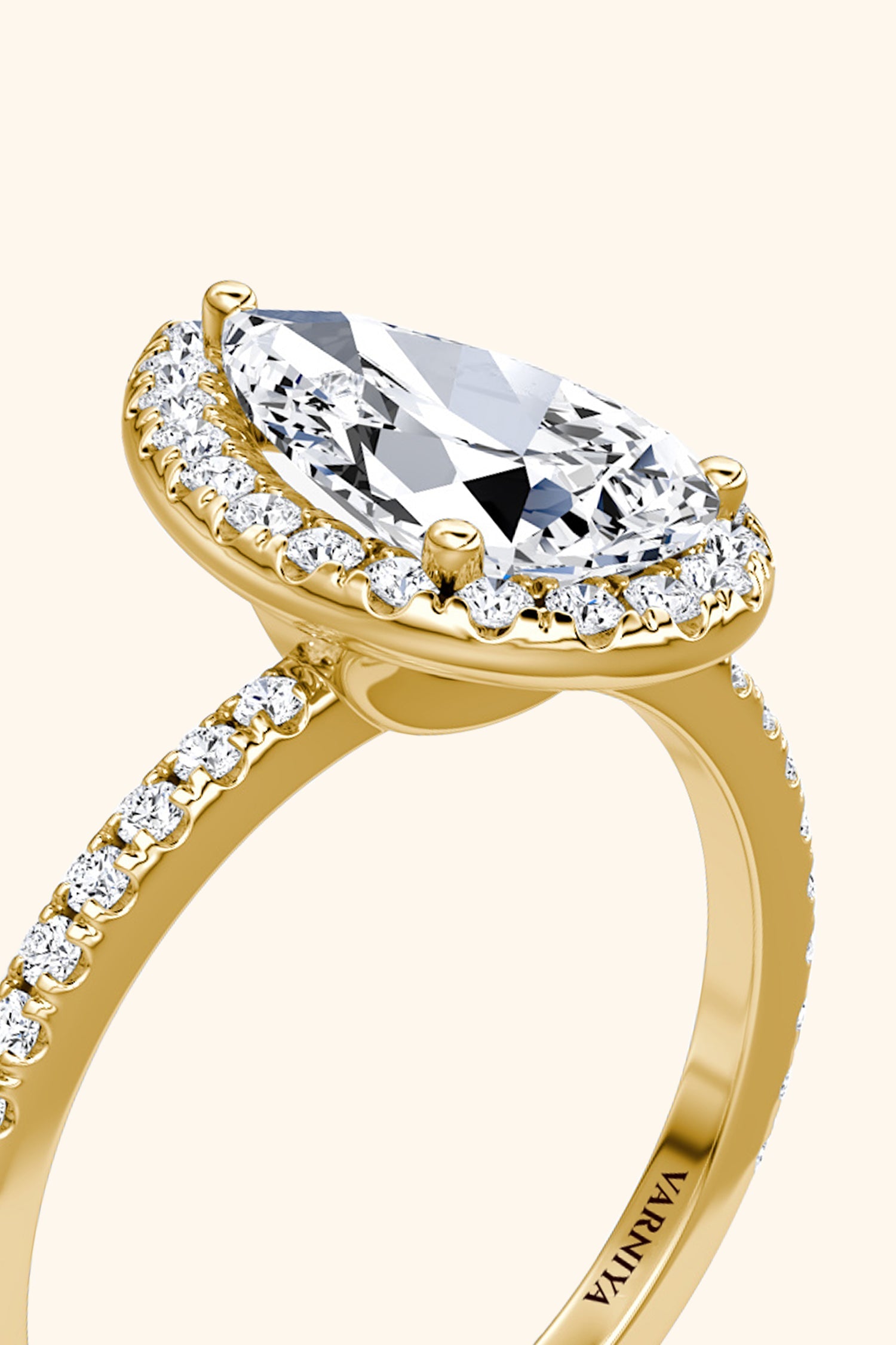 Angelica Pear Solitaire Pavé Ring with a Classic Halo