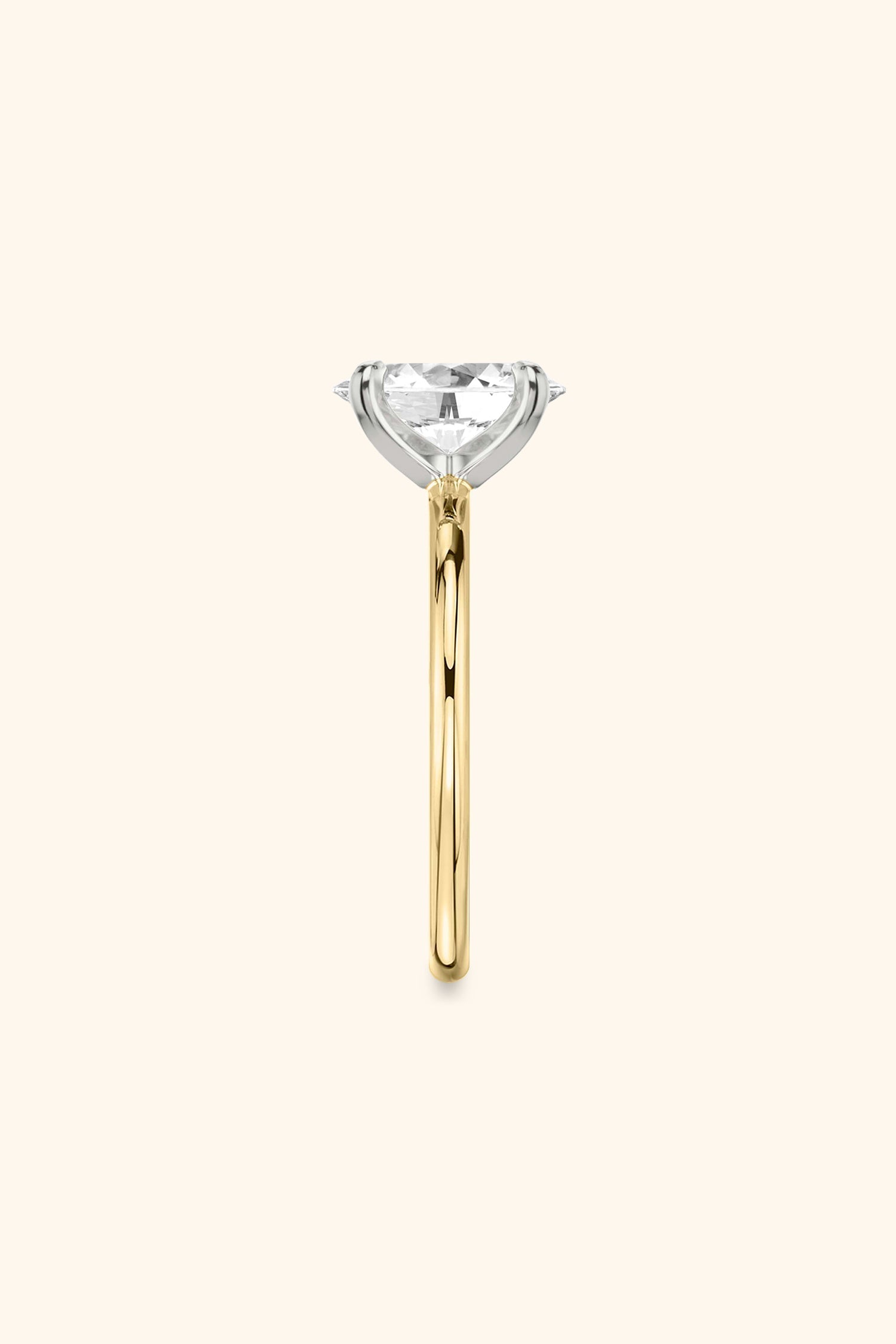 Dual Tone Glance Ring with an Oval Solitaire.