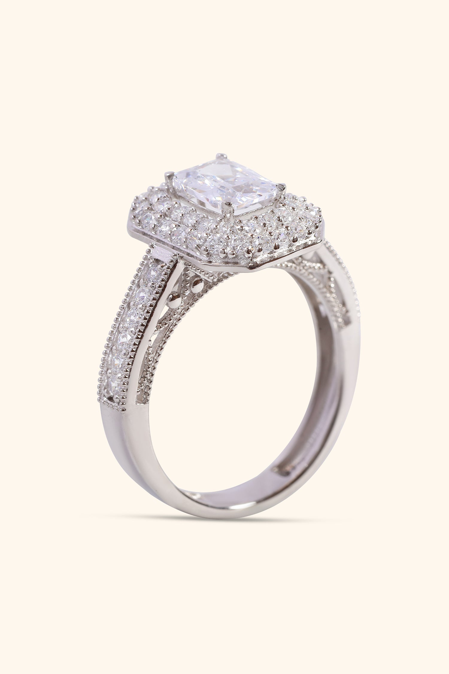 Celestina Double Studded Halo and Pave Ring with Emerald Solitaire