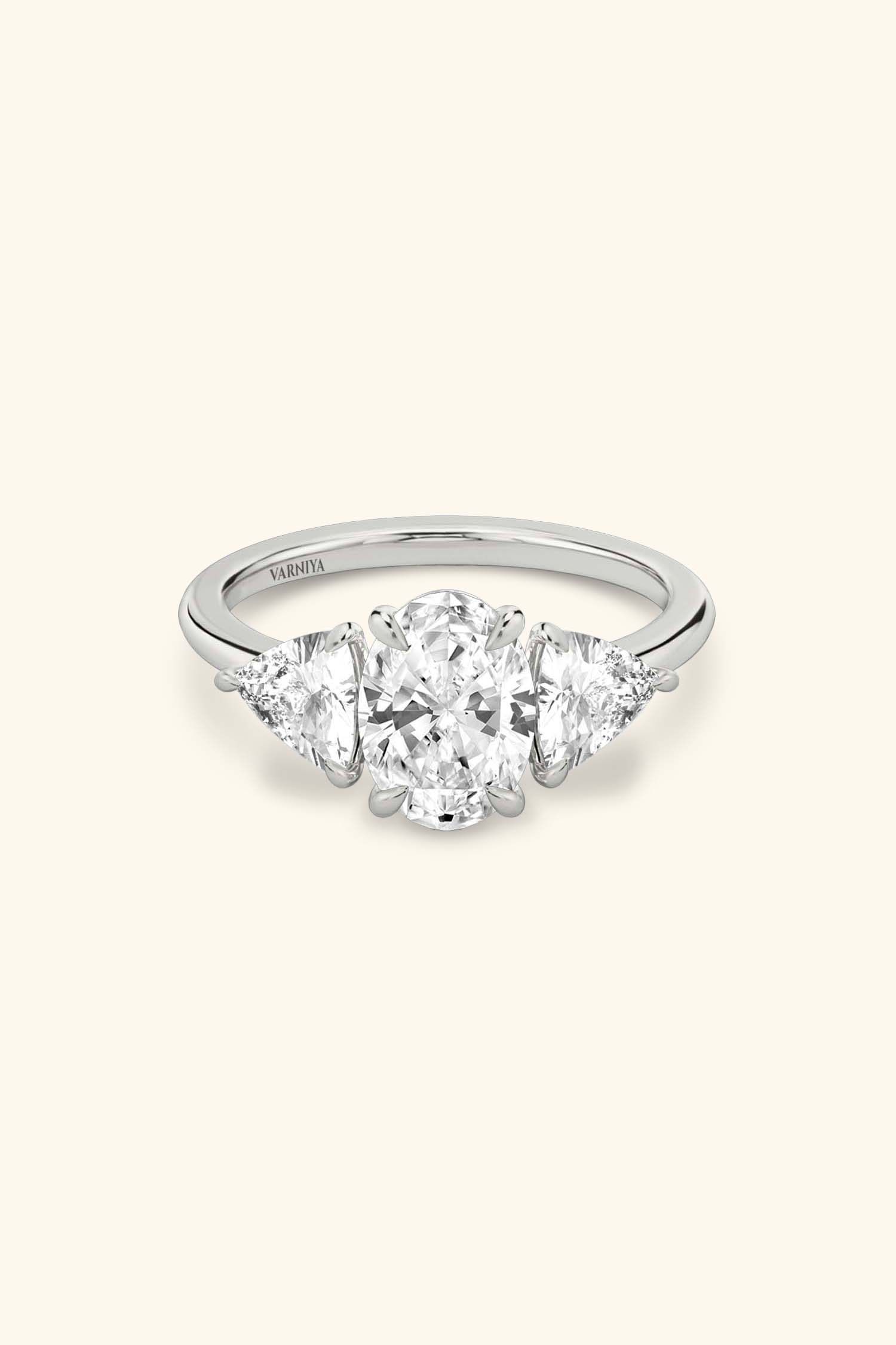 Trilogy Grace Oval with 1/2 Ct Trillion Side Stones