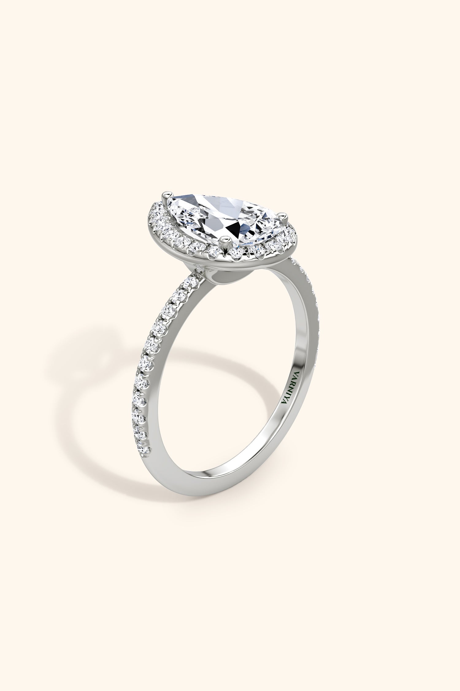 Angelica Pear Solitaire Pavé Ring with a Classic Halo
